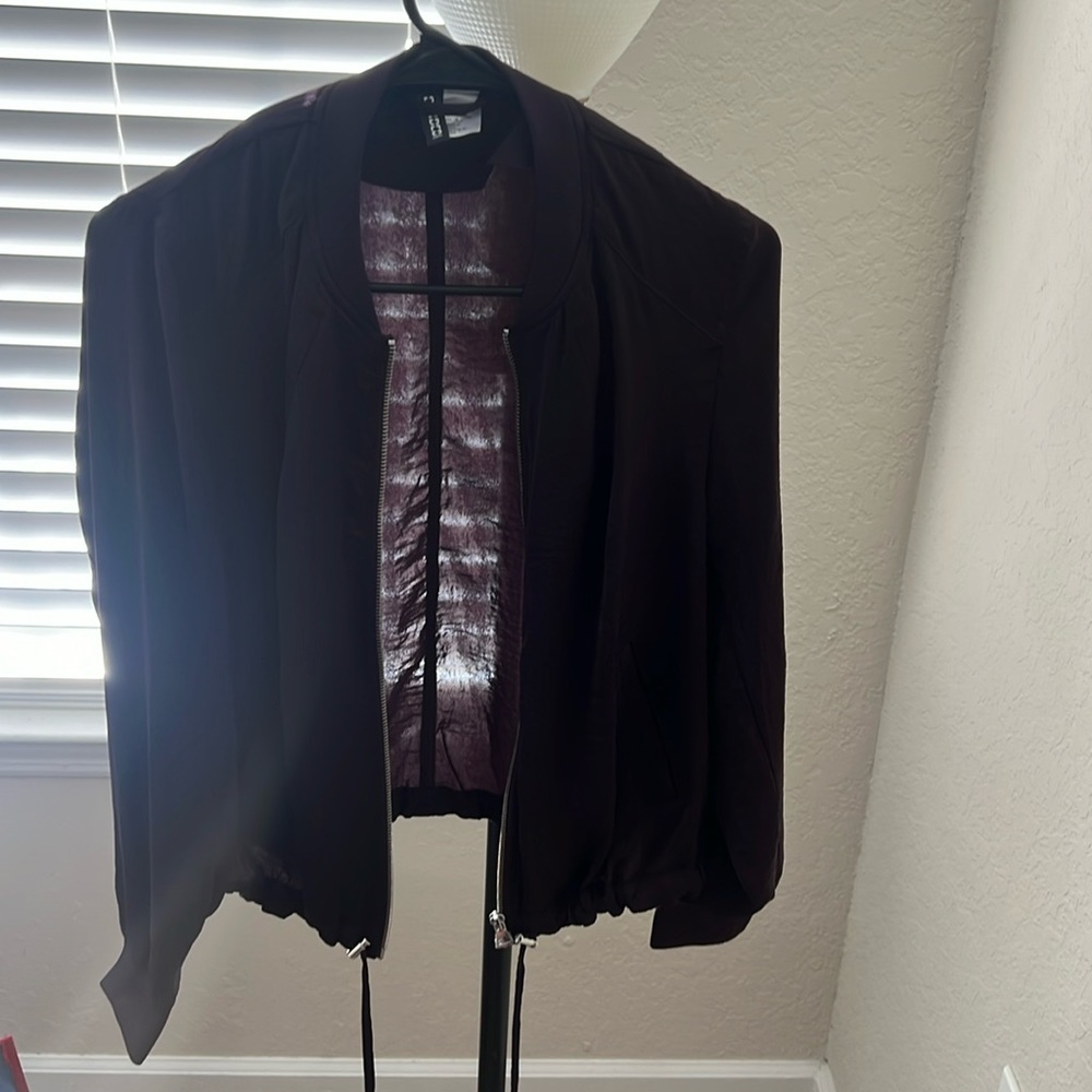 Womens plum windbreaker style jacket size 8